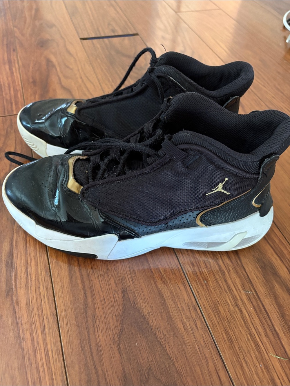 Jordan Black and Gold Basketball shoes